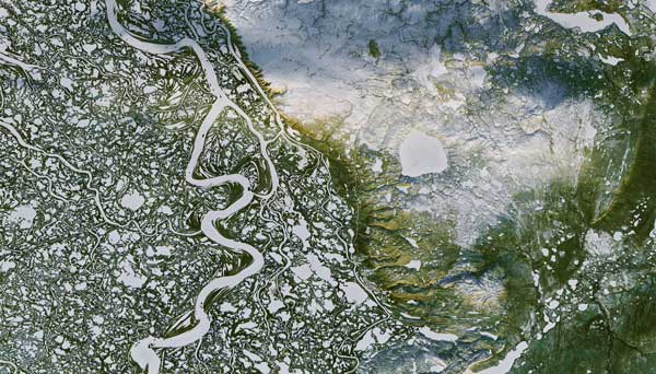 Watersheds are highly interconnected, often spanning geographical and political boundaries. Mackenzie River Delta, Northwest Territories .